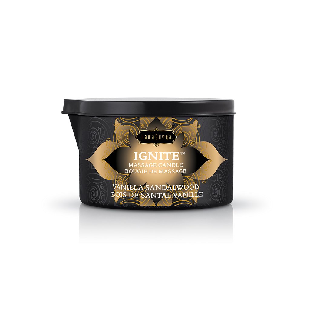 Kama Sutra Ignite Vanilla Sandalwood Massage Candle 6 Oz in a sleek black container, ideal for sensual massage experiences.