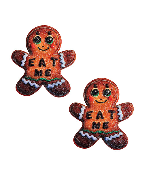 Neva Nude Yum Yum Gingerbread Man Glitter Pasties Brown with glittery gingerbread man design saying 'EAT ME'.