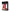Pleasure Wigs Rose Pink Costume Wig showcased on packaging with sleek design and vibrant color.
