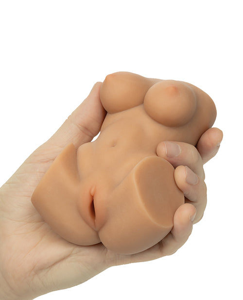 Cheap Thrills The Aerobics Instructor Stroker Caramel held in a hand, showcasing its lifelike texture and design.