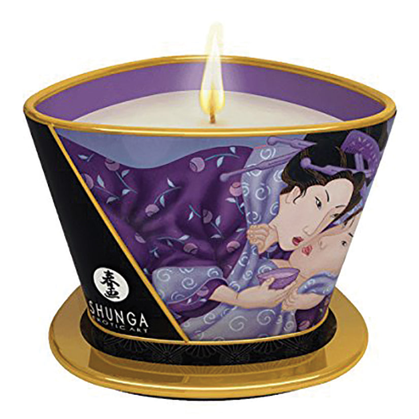 Shunga Massage Candle Exotic Fruits Libido 5.7 Oz lit, features vibrant design, enhances ambiance and provides silky massage oil.