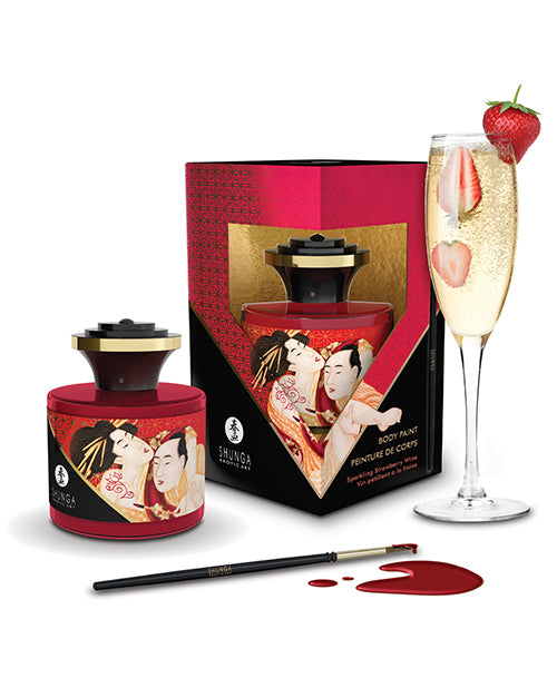Shunga Body Paint Sparkling Strawberry Wine 1.7 Oz packaging with a glass of drink and strawberries on the side.