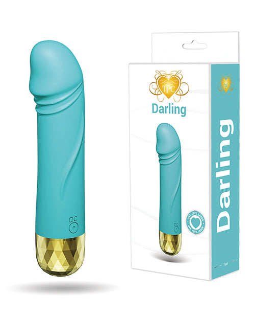 The Pleasure Company Darling Bullet Vibrator Turquoise with packaging, showcasing its sleek design and gold base.