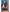 Dreams by Baci Badge of Desire Cop Costume Set Black Queen featuring a confident model wearing a cropped police uniform.