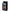 Dreams by Baci Badge of Desire 4 Piece Costume Set Black packaging with model wearing costume.