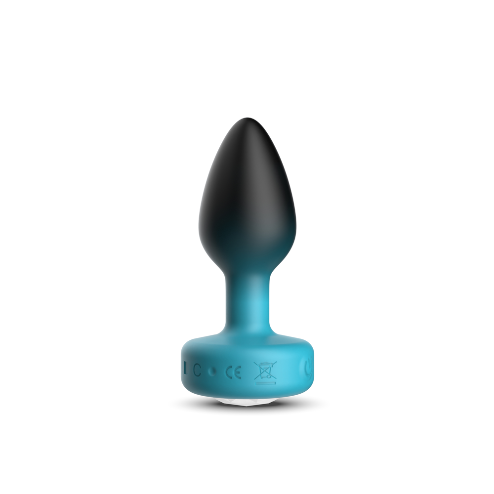 Eluxe Vibrating Clear Gem Blue Ombre Plug Small With Remote displayed in a striking design with a tapered silhouette.