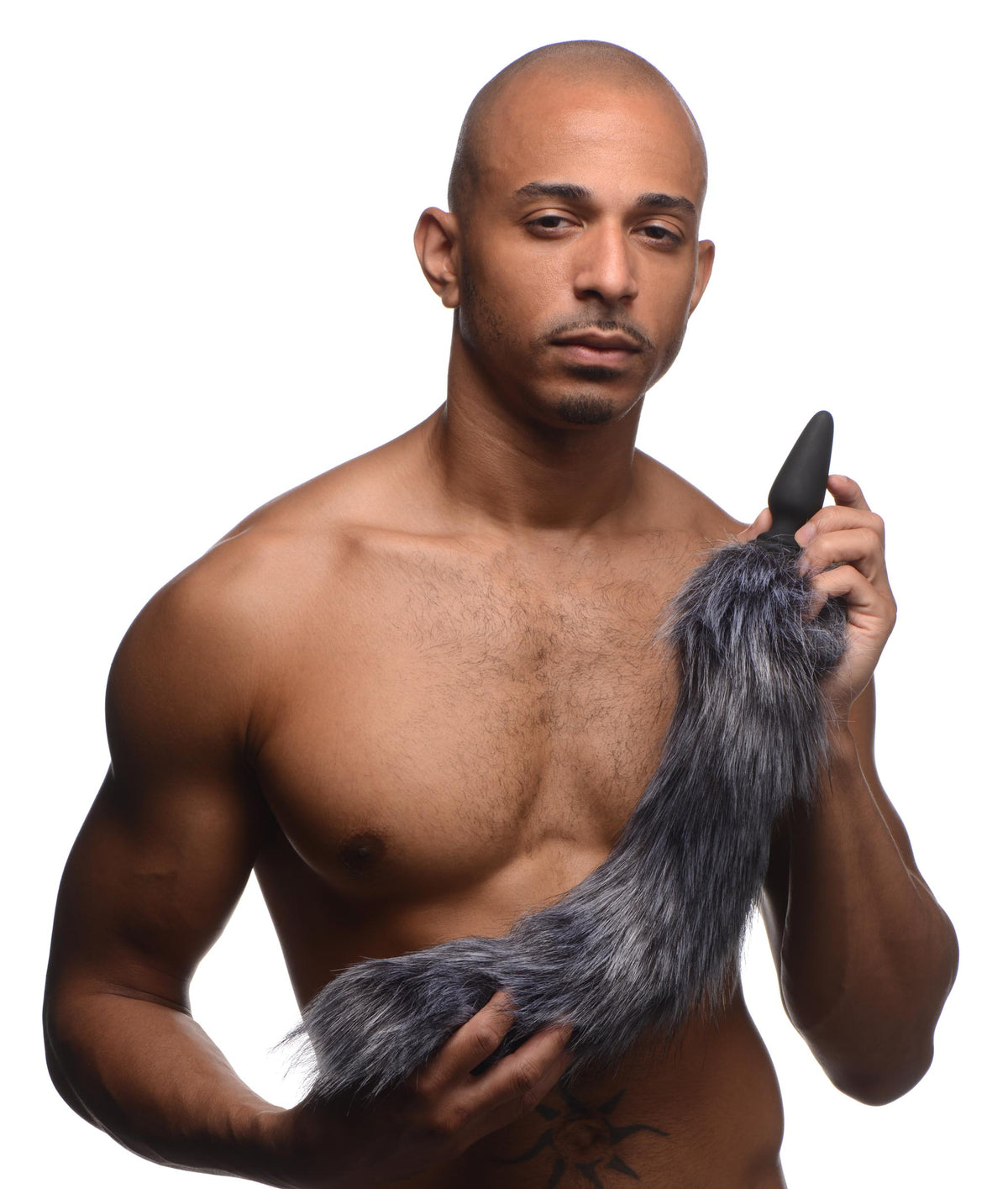 Tailz Silicone Anal Plug with 3 Interchangeable Tails held by a model showcasing the gray fox tail.