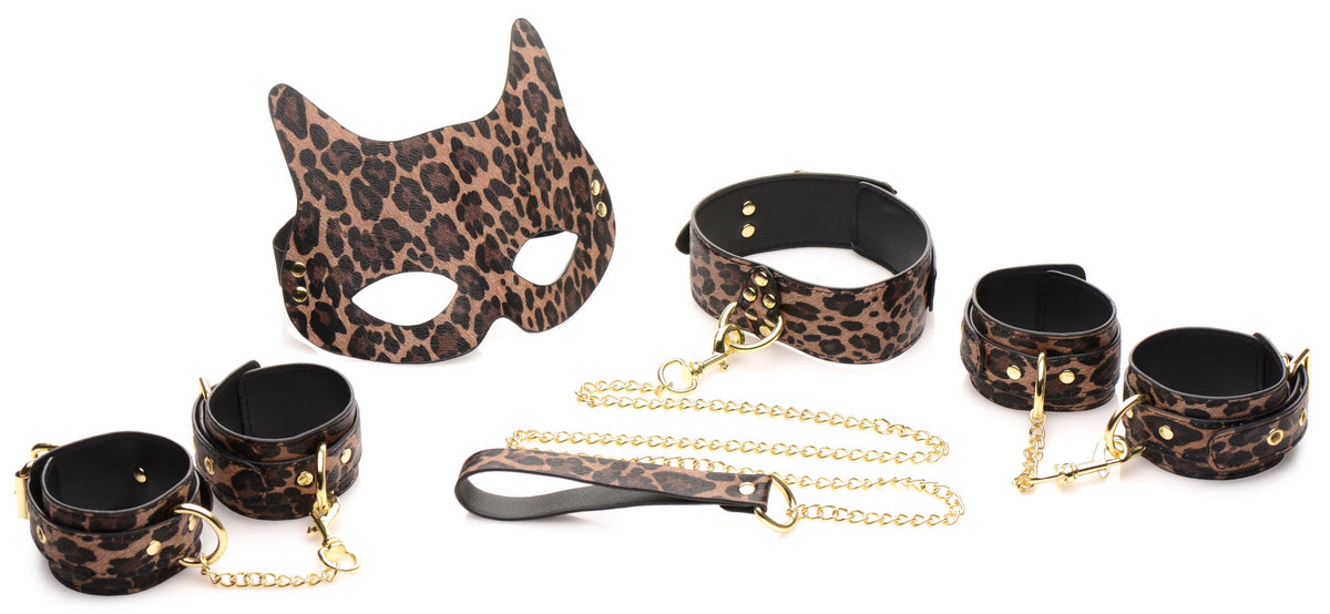 Master Series Wild Sex 7 Piece Jaguar Print Bondage Set featuring cuffs, mask, and leash in a bold jaguar print.