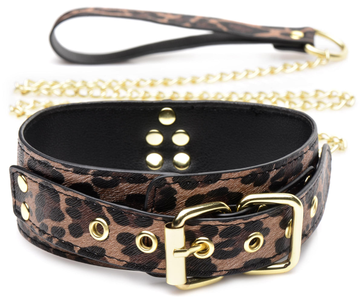 Master Series Wild Sex 7 Piece Jaguar Print Bondage Set with a leopard print collar and gold accents.
