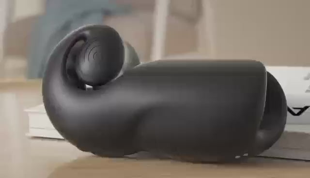 SVibe Snail Evo Dual Male Masturbator Navy displayed on a surface, showcasing its ergonomic design.