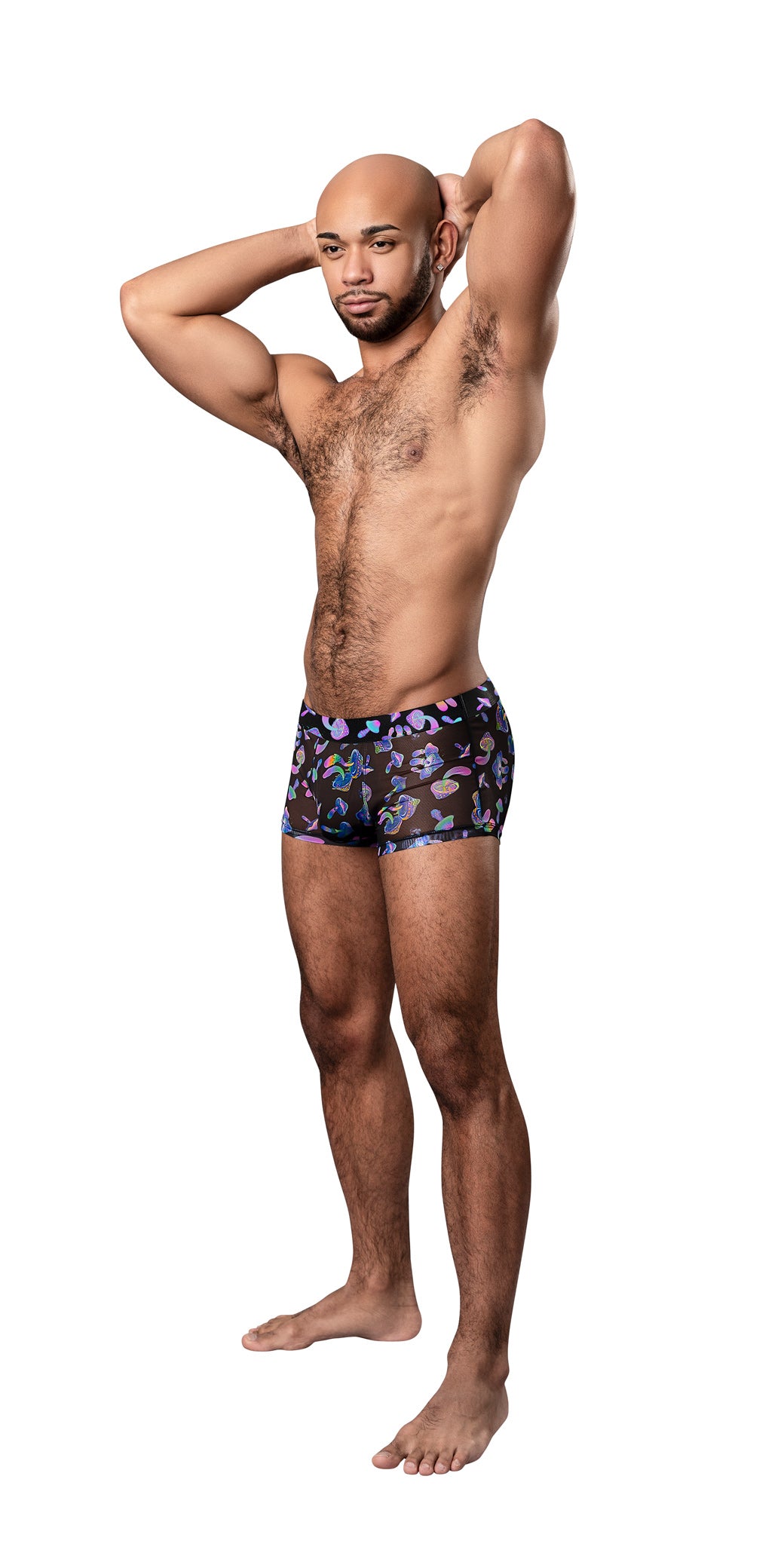 Male Power Hazy Dayz Pouch Short Large Mushroom model showcasing playful mushroom print and body-contouring design.