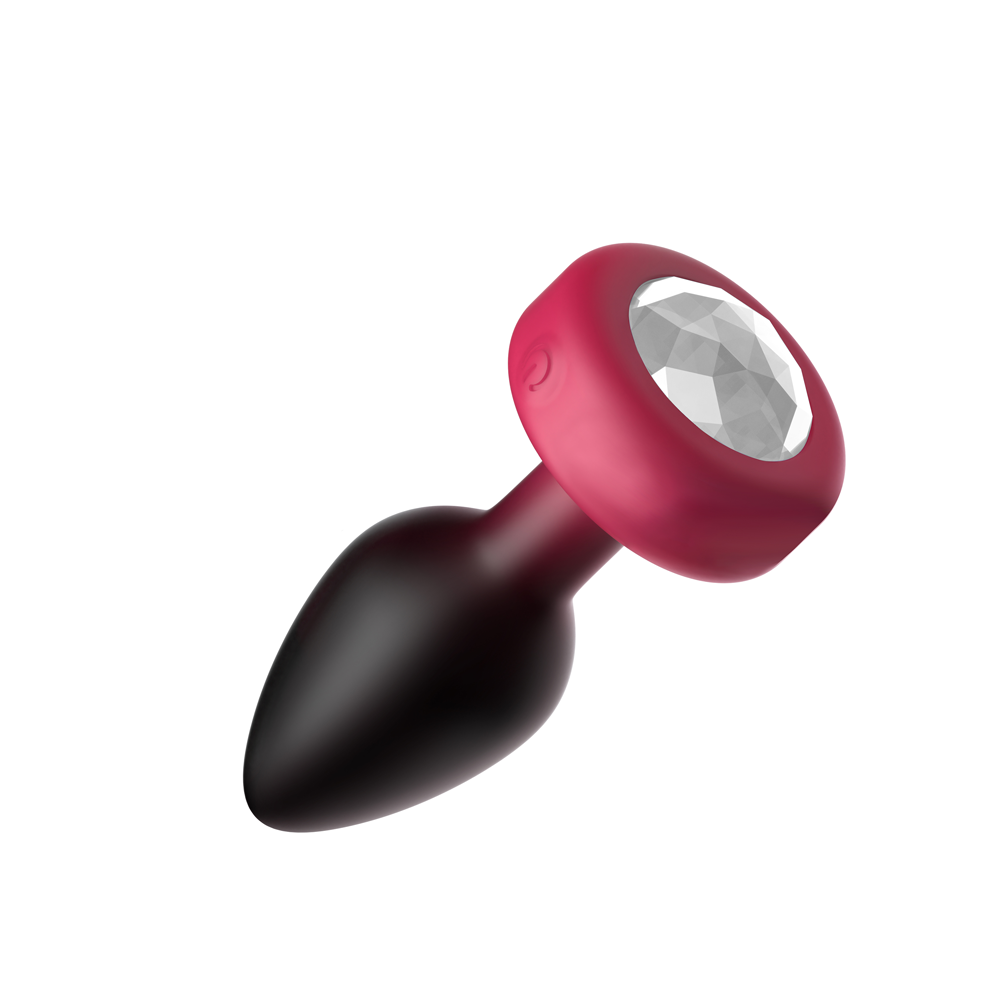 Eluxe Vibrating Ruby Ombre Anal Plug Medium Remote with a shiny gem base in ruby color.