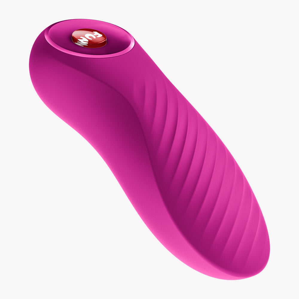 Fun Factory Bijou Bullet Vibrator Magenta with wavy texture and compact design for travel-ready pleasure.