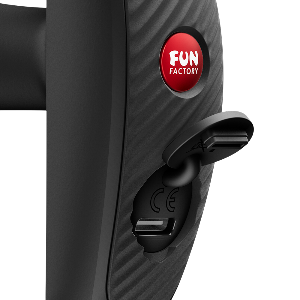 Close-up of the Fun Factory Bootie Vibe Anal Vibrator Black showing charging port and brand logo.