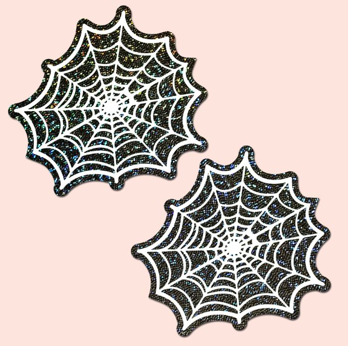 Pastease Glitter Black Glow In The Dark Spider Pasties shaped like spider webs with black glitter and a glowing effect.
