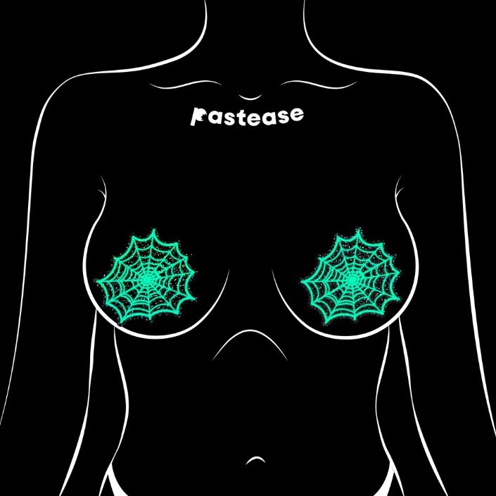Pastease Glitter Black Glow In The Dark Spider Pasties on a silhouette with spider web designs.