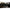 Extreme Black Latex Vacuum Bed with a figure sealed in black latex for complete immobilization.